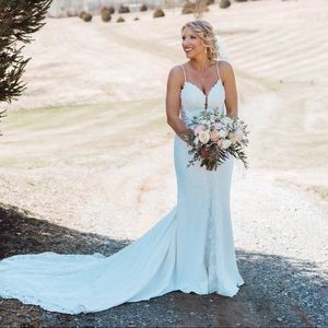 Martina Liana Wedding Gown Style 1004. Bottom was altered